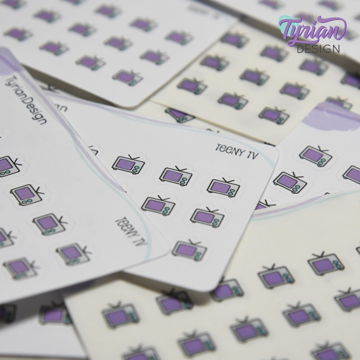 Teeny TV Stickers | Tiny Icon TV stickers on a mini sheet | 21 stickers | .37 x .36" each | Binge Watch icon sticker | White or Clear Matte