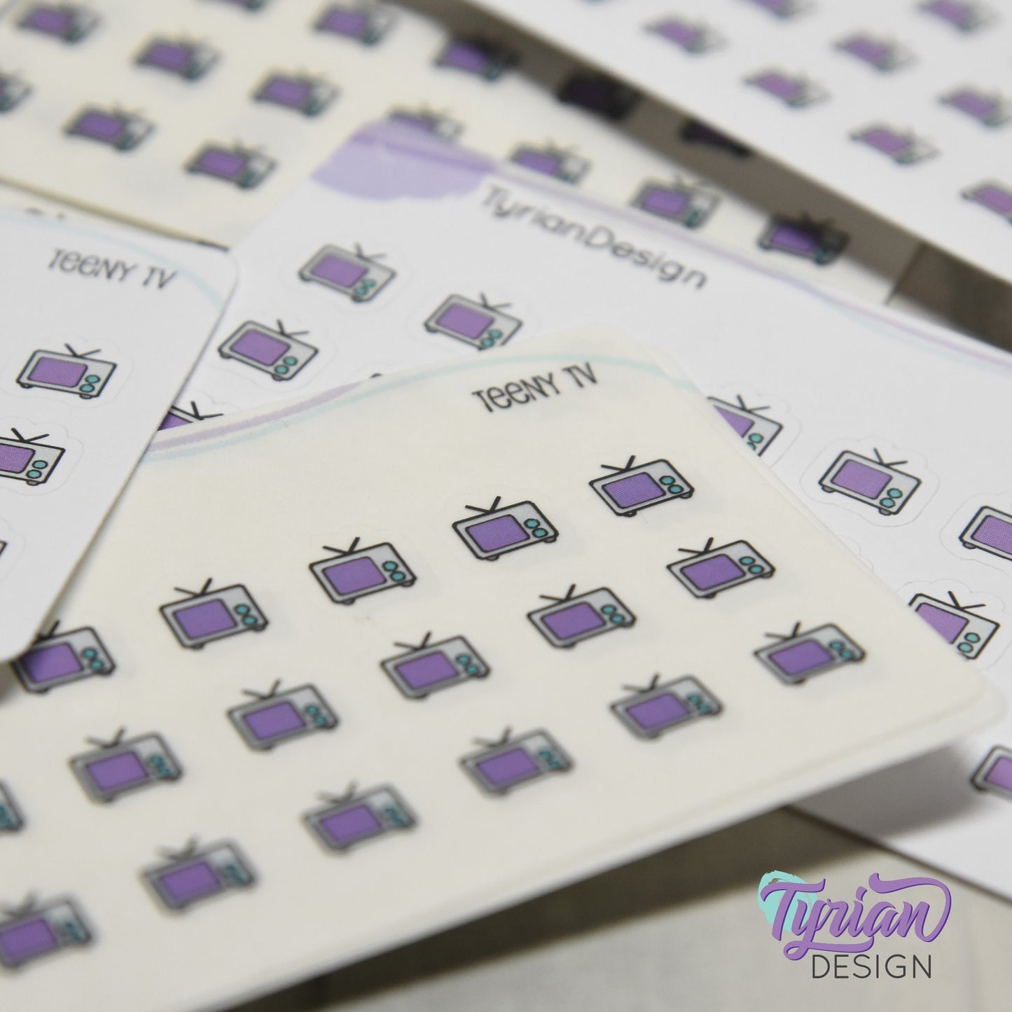 Teeny TV Stickers | Tiny Icon TV stickers on a mini sheet | 21 stickers | .37 x .36" each | Binge Watch icon sticker | White or Clear Matte